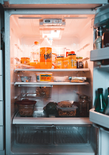 photo of interior of refrigerator full of food